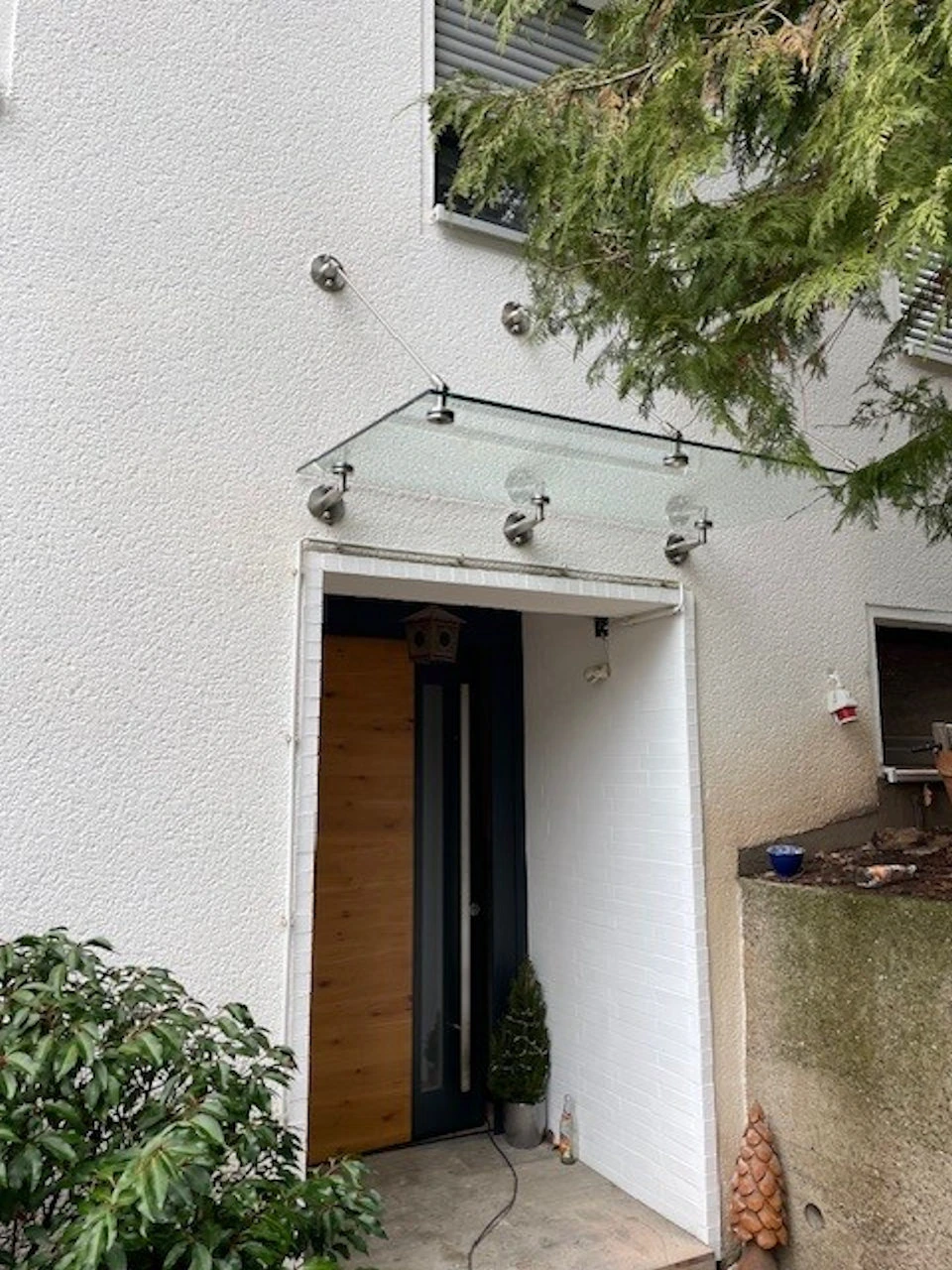 Vordachsystem aus Edelstahl und Klarglas zur Selbstmontage für Heimwerker und Profis